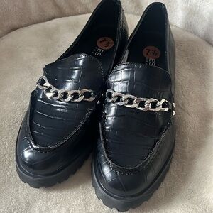 Jones NY black faux leather loafers with silver chain detail